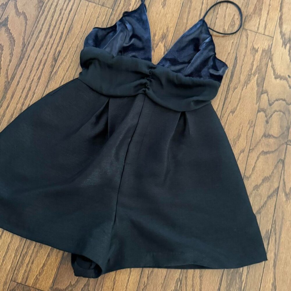 Black Free People romper brand new Perfect for holidays